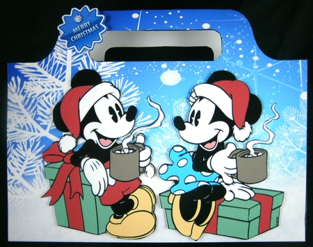 Sitting together mickey and minnie in the snow tote bag by Linda Short