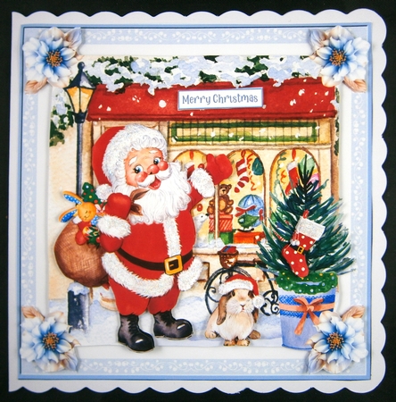 Christmas Santa at the Toy Shop 7x7ins Topper  by Linda Short