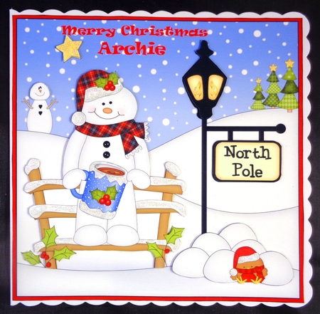 8 x 8 Christmas at the North Pole Snowman Mack has a mug of Hot Chocolate Scalloped Corner Topper  by Linda Short