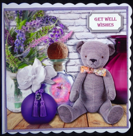 Teddy with purple accessories by Linda Short
