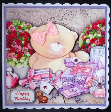 Forever friends bear surrounded by gifts and flowers by Linda Short