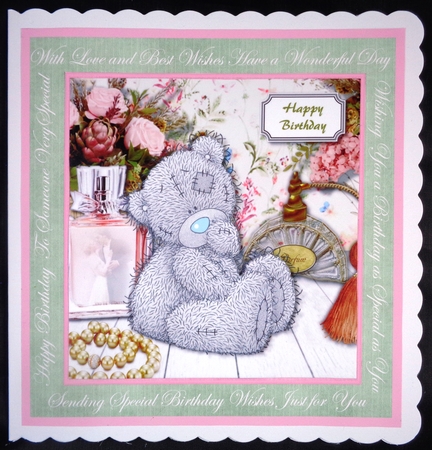 Tatty teddy with perfume and flowers with a vintage look by Linda Short