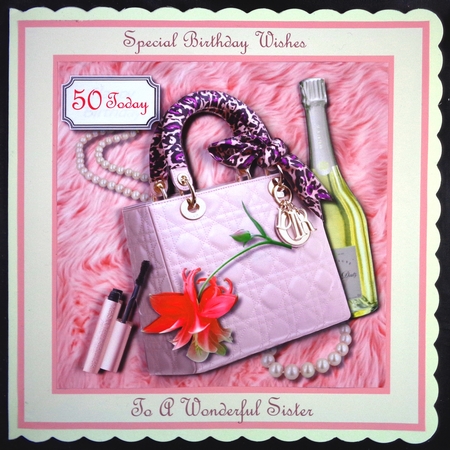 Ladies accessories on pink fur background by Linda Short