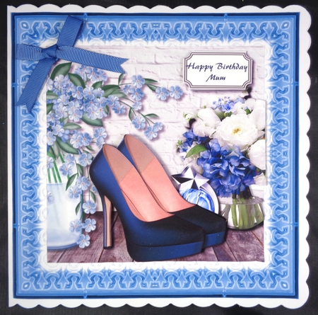 Blue shoes and flowers by Linda Short