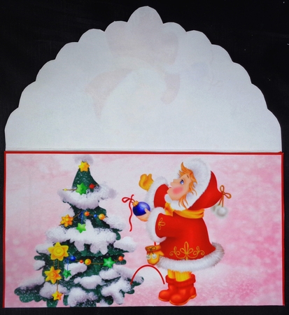 Decorating the Christmas tree pink money wallet by Linda Short
