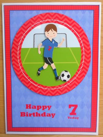 Boy in Dark Blue Kit in Oval Frame by Linda Short