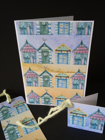 A4 Paper Beach Huts On Blue/Yellow Background by Lisa Lee