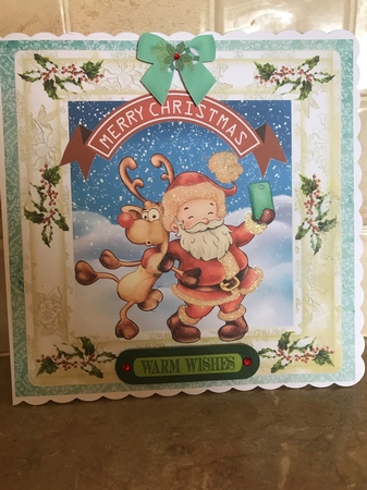 Santa and reindeer taking a selfie  in the snow 8x8 by Liz Kiely