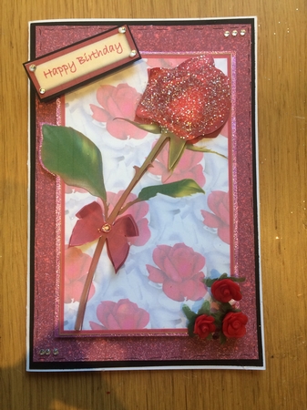 With a rose by Lois Robinson