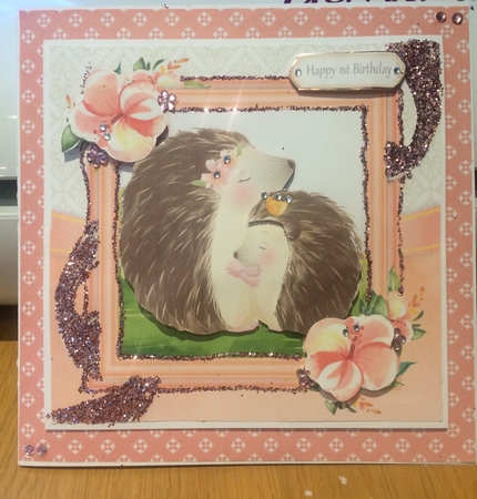 Cuddling Hedgehogs With Pink Flowers 7x7 by Lois Robinson