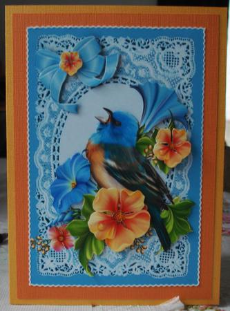 Bird with Flowers on Vintage Blue Lace by Lorraine Wilson