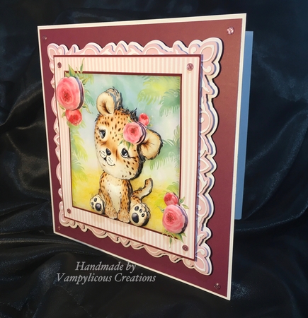 Gorgeous Baby Leopard with Flower  by Louise Patten