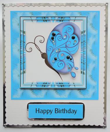Turquoise Butterfly with Black Spots by Lyn Ainscough-Ambrose
