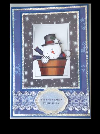 Snowman in a Barrel in Dark Grey Frame by Lynda Harman