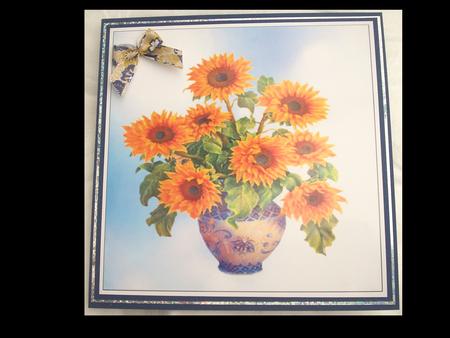 Sunflowers in a Blue Vase by Lynda Harman