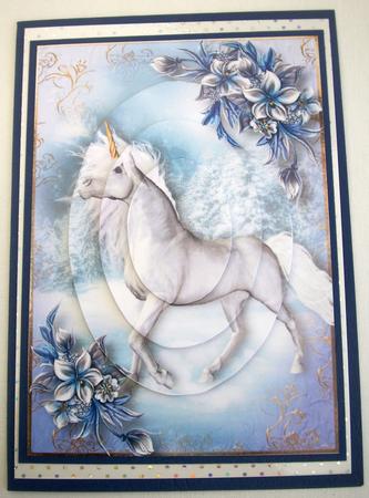 The Snow Unicorn & Winter Flowers Pyramid Topper by Lynda Harman