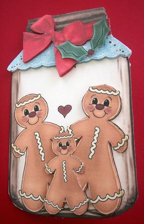 Gingerbread Family in a Jar with Bow and Holly by Lynda Harman