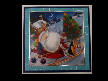 Santa Flying Over the Roof Tops, Oval Pyramids by Lynda Harman