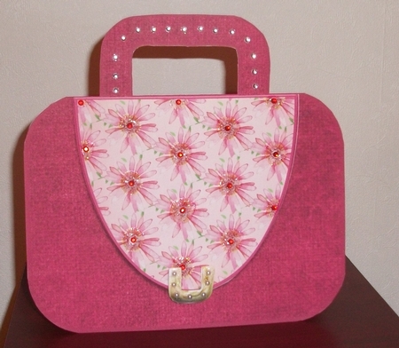 Pink handbag with floral flap and metal clasp mini kit by Lynda McCracken