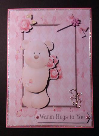 Cuddly Teddy Bear with Flowers by Lynda Tully