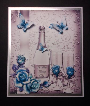 Gorgeous Silver and Blue Shimmer Wedding/anniversary Topper by Lynda Tully