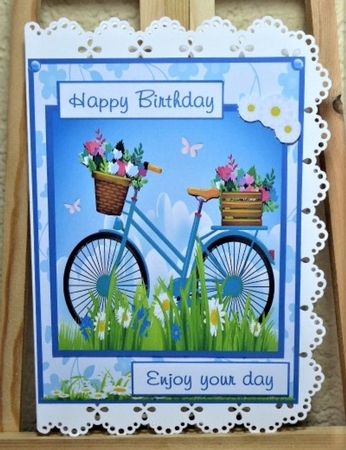 Birthday greeting card with bicycle and daisies flowers by Lynn Butters