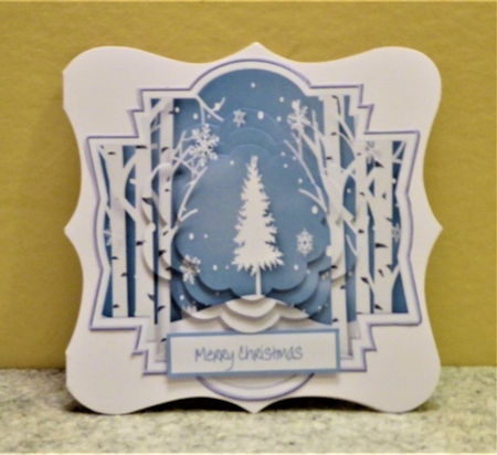 Christmas tree and snowflake shaped topper by Lynn Butters