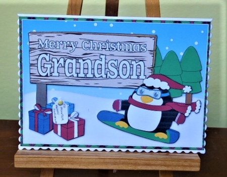 Christmas Fat Penguin Snowboarding with sign GRANDSON a5 by Lynn Butters