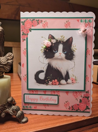 Black and white cat with flowers greeting card by Lynn Butters