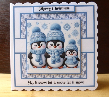 a penguin family by Lynn Butters