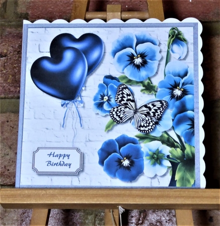 Pansies, balloons and butterfly by Lynn Butters