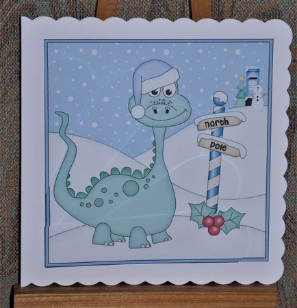 Christmas Dinosaur is at the North Pole Fan Pyramage Topper by Lynn Butters