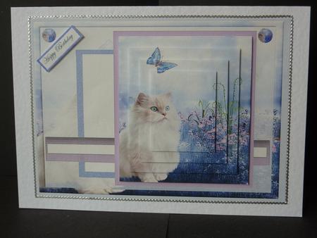 Cat in the Flowers by Lynn Butters