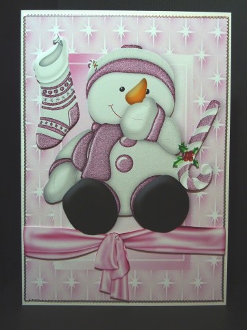 Cheeky Snowman with Stocking in Star Frame by Lynn Butters