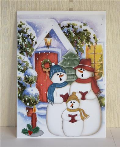Cottage in Snow, with Singing Snowmen by Lynn Butters