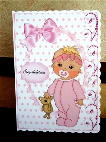 Baby Girl in Pink Baby Grow by Lynn Butters
