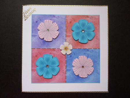 Fabric Flowers on Patchwork by Lynn Butters