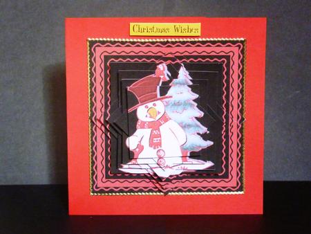 Snowman on Red and Black Star Pyramid by Lynn Butters