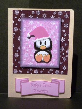 Penguin Baby Girl's First Christmas by Lynn Butters
