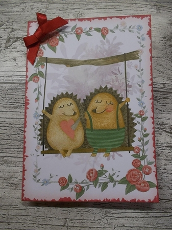 Hedgehog couple on swing cut and fold card by Crafty Lynn