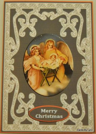 Angel and Baby Jesus Surrounded by Lace A4 by Lynn Mason