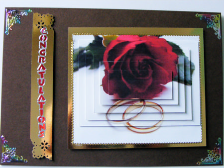 Red Rose and Wedding Rings by Lynne Faulkner