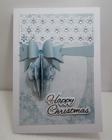 Christmas bauble with lace and bow topper by Lyn Simms