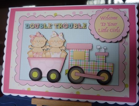 Double Trouble Twin Girls  by Maida Blades