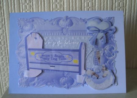 Gorgeous Baby Boys Rocking Crib with Hamper by Margaret Barker