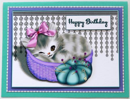 Grey Kitten in Basket by Margaret Dittmann