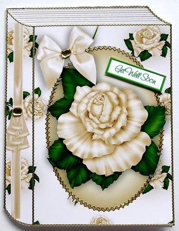 Cream Roses in Oval Frame with Bow Folded Book by Margaret Dittmann