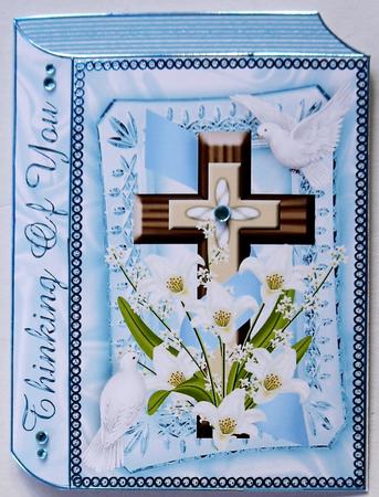 Thinking of You, Cross with Flowers on Blue Folded Book by Margaret Dittmann