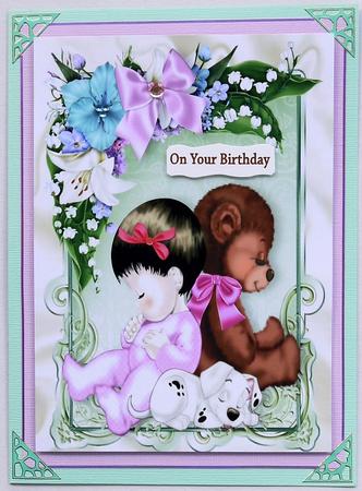 Cute Baby Girl with Teddy Puppy in Frame of Flowers with Bow by Margaret Dittmann
