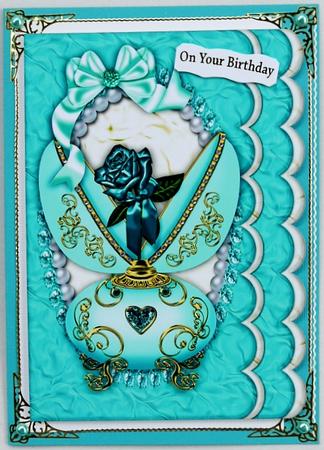 Beautiful Porcelyn Egg with Turq Rose, on Scalloped Frame A4 by Margaret Dittmann